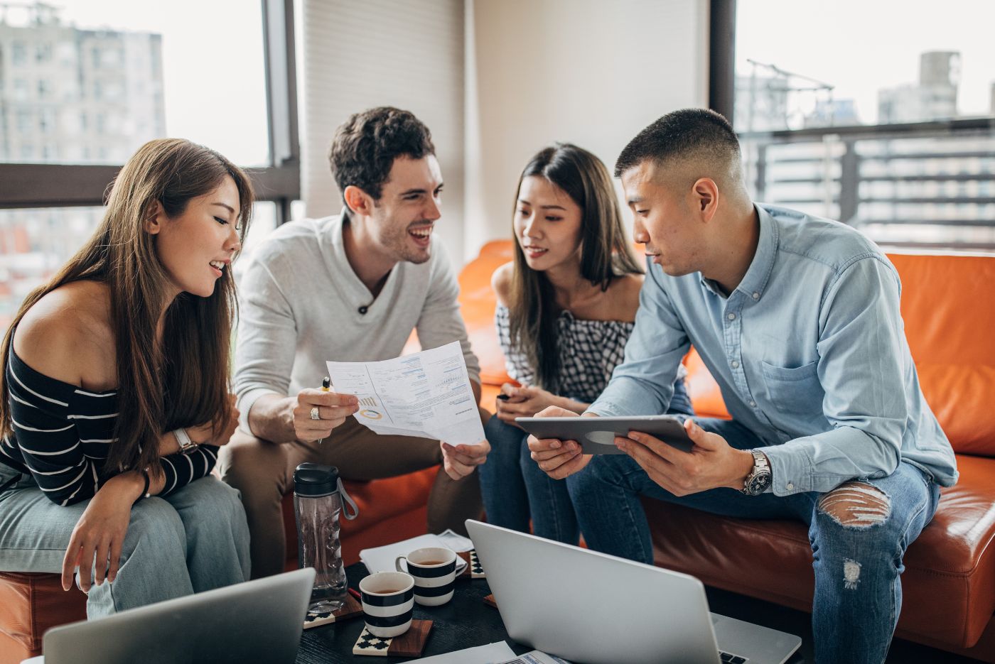 Millennials-sitting-on-couch-working