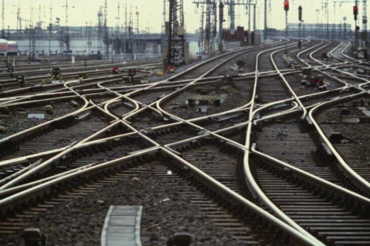 Many railway lines merging to demonstrate uncertainty with plans