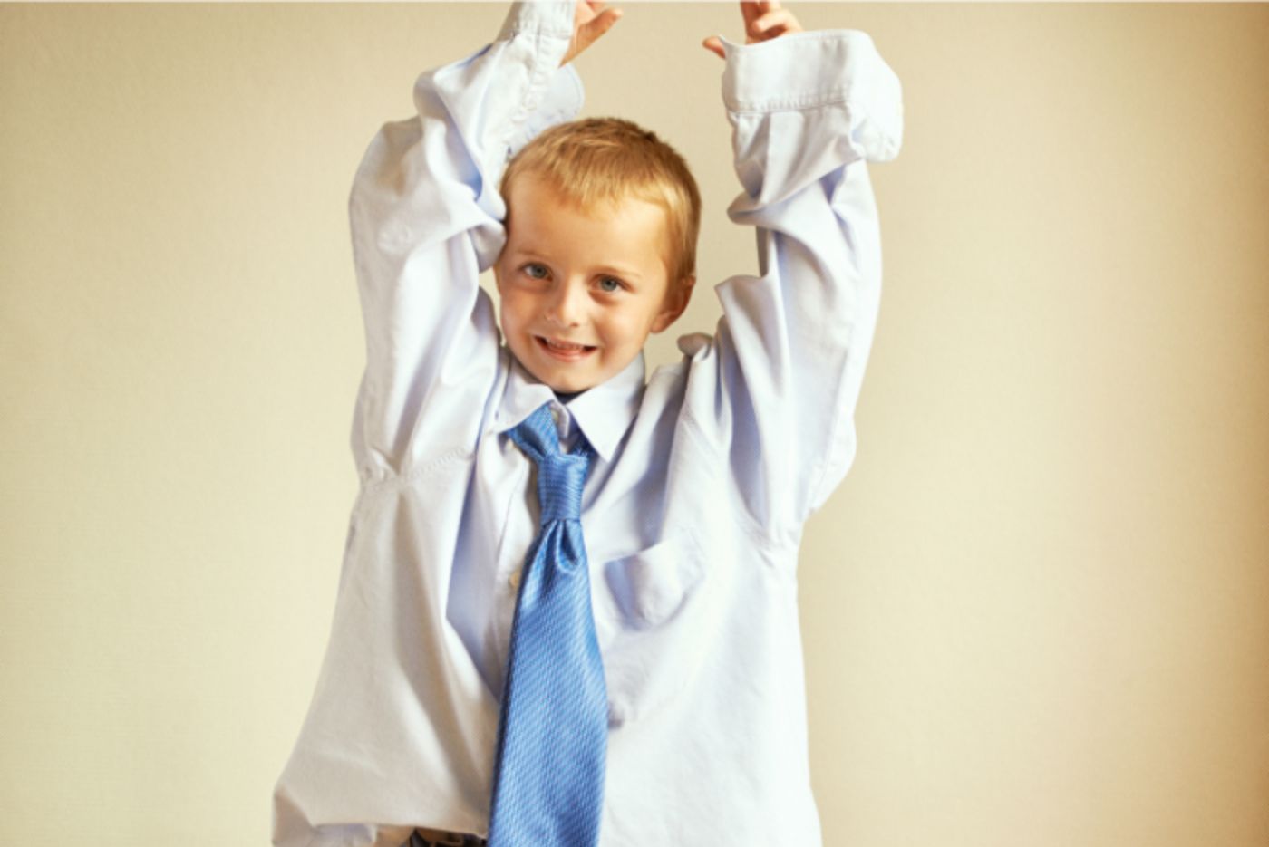 Child wearing business shirt